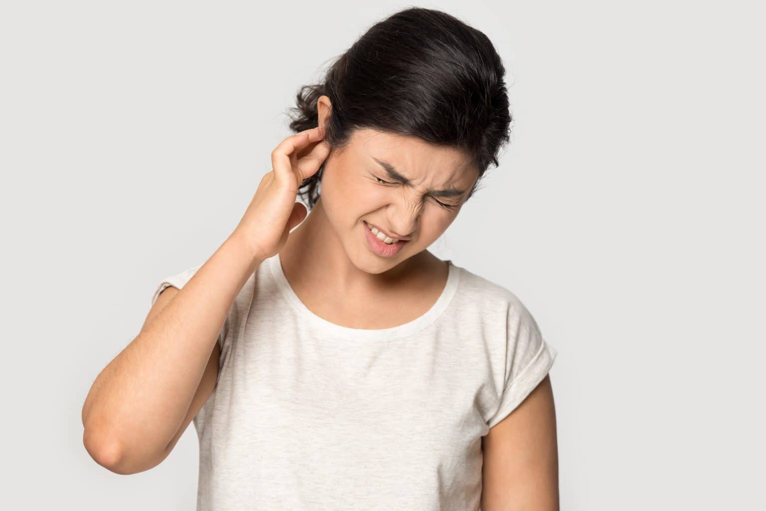 Cholesteatoma Symptoms Woman Holding Ear Due to Cholesteatoma